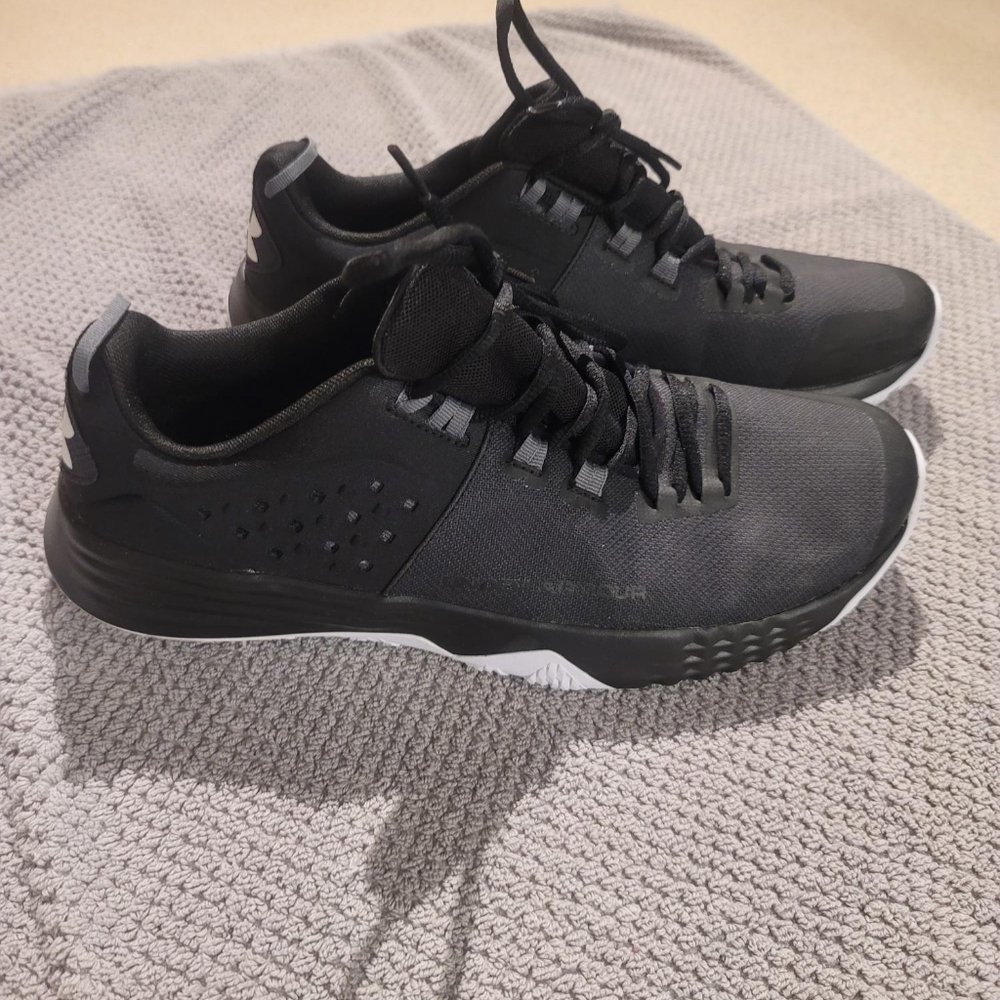 Size 11.5 Under Armour running shoes.